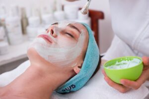 woman getting facial and chemical peel